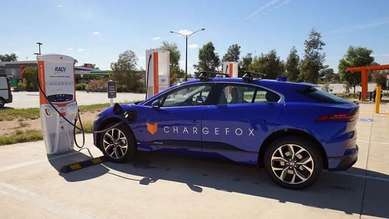 Electric vehicle charging at a Chargefox fast-charging station